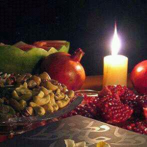 Candle and fruits